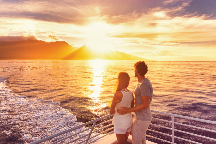couple watching sunset on a cruise