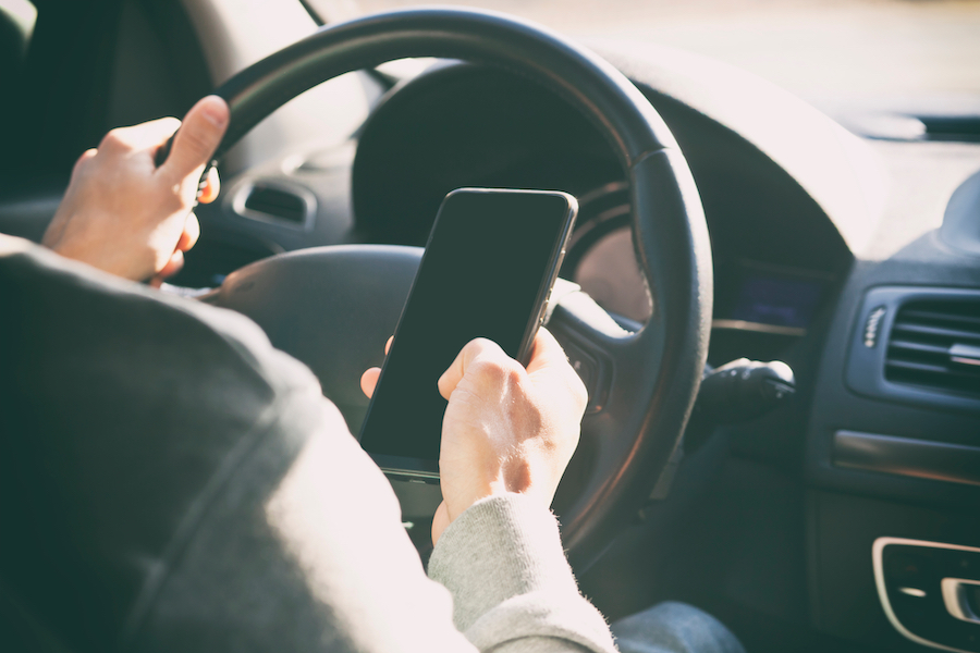 person on phone while driving
