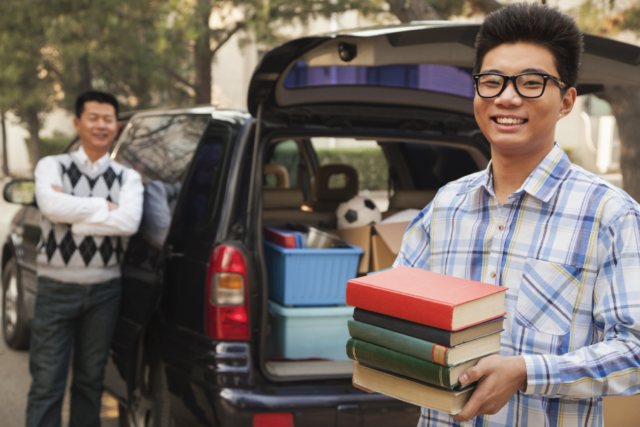 college bound student packing car 