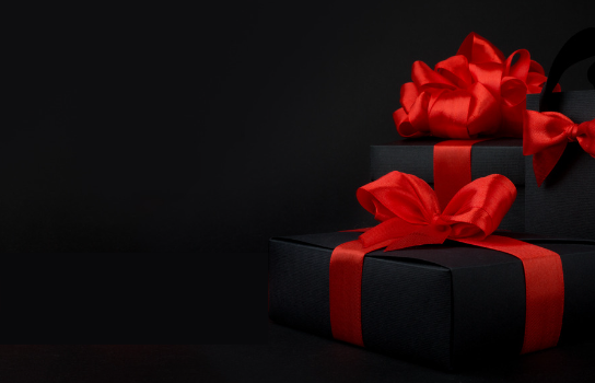 Black gift box with red ribbon