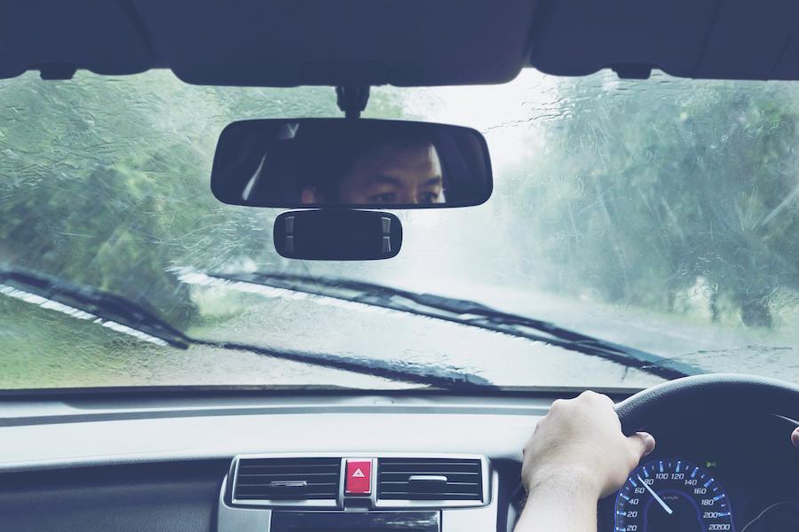 Person driving in the rain